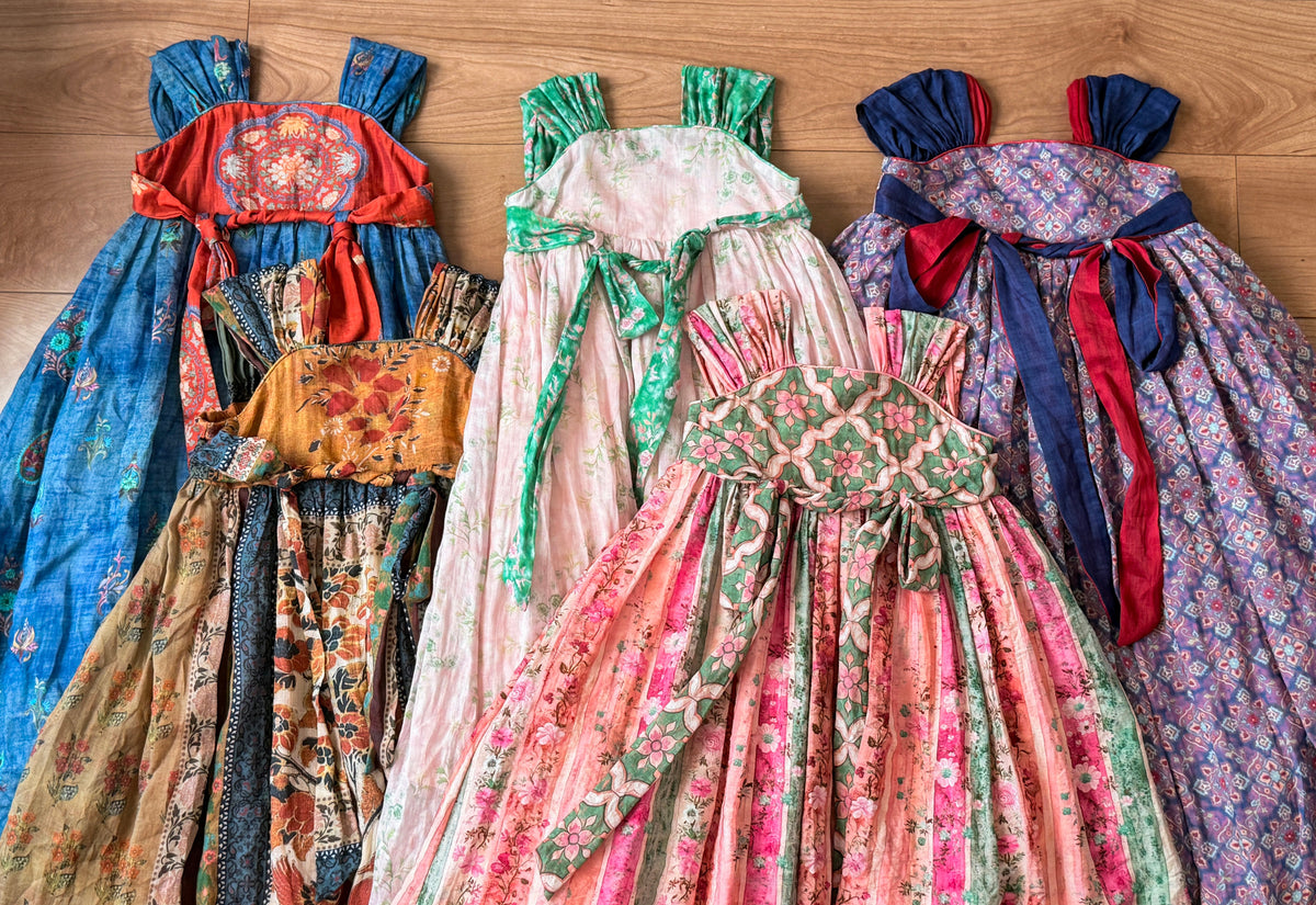 Indigo Ember blue and vermilion Hanfu-inspired girls' dress, flat-lay view