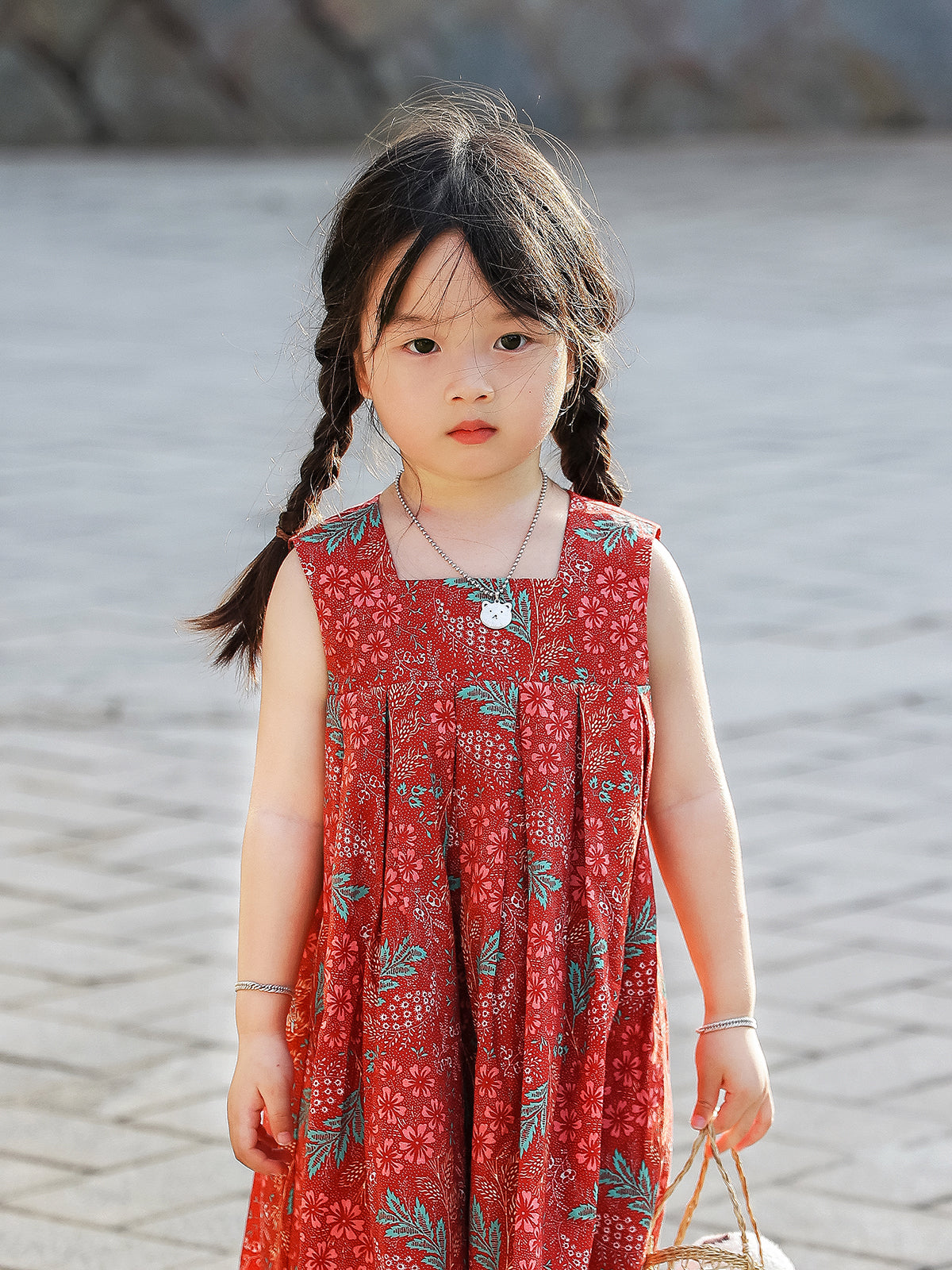 Front view of Holiday Bloom red floral sleeveless dress