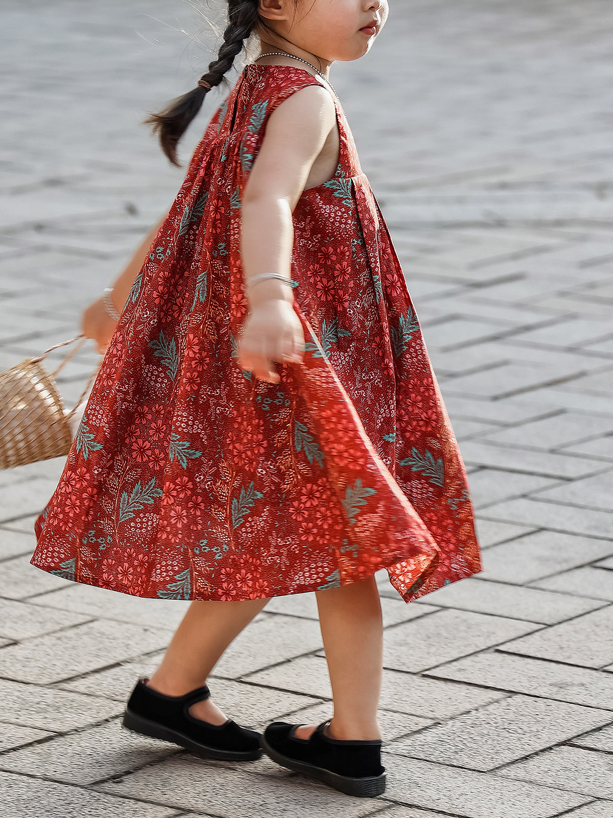Close view of the Holiday Bloom red floral sleeveless dress