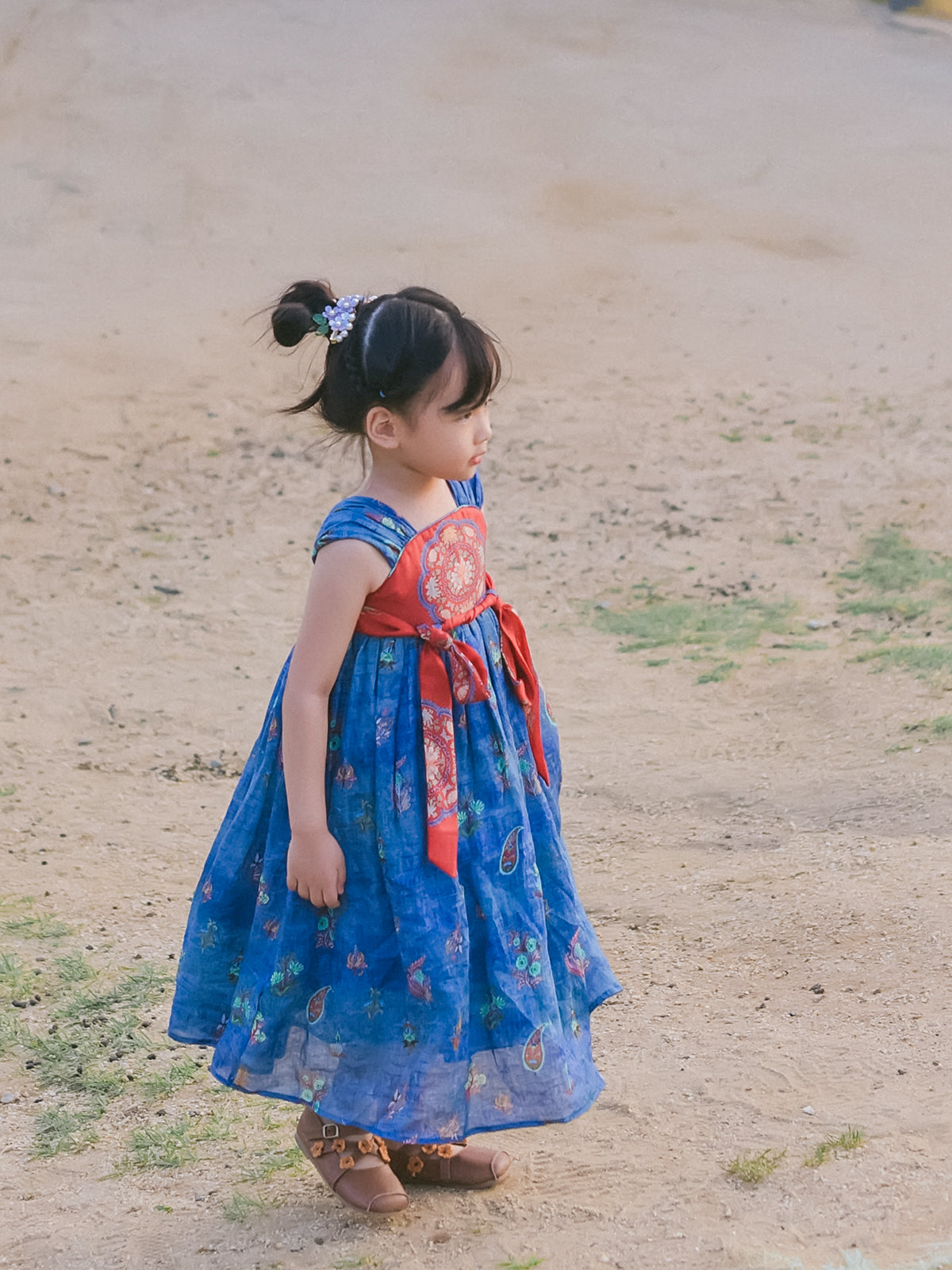 Girl modeling the Indigo Ember blue Hanfu-inspired celebration dress