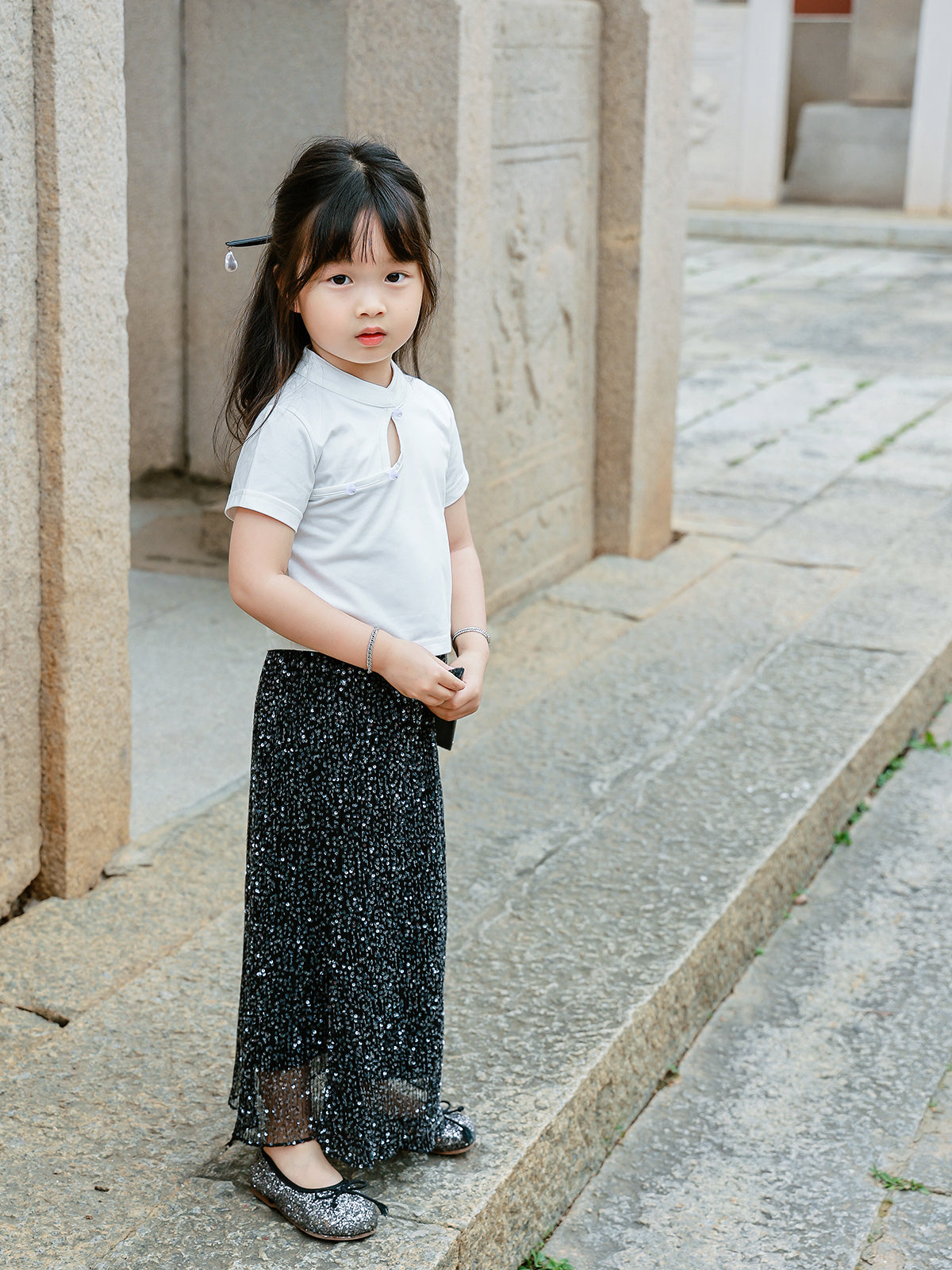 Girl wearing the Little Cloud Mandarin collar tee in Pure White, full-length front view