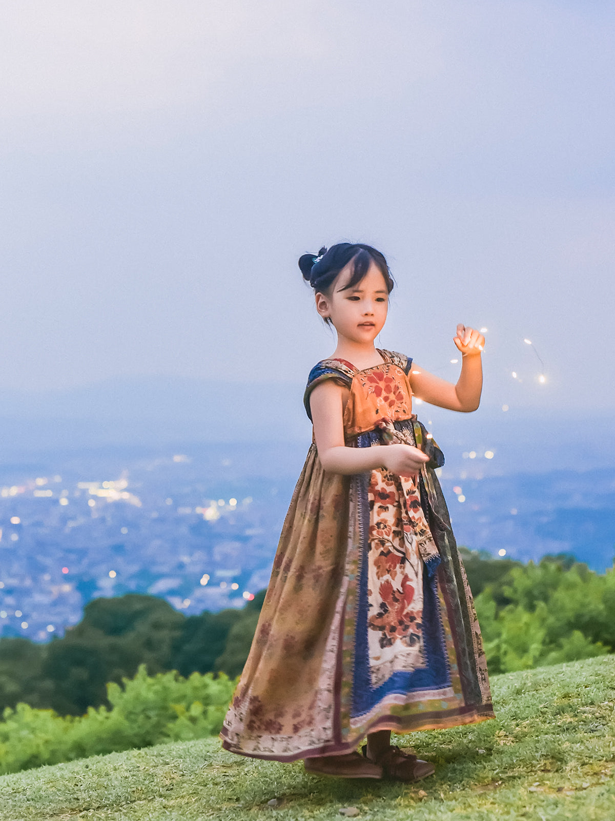 Girl wearing the Mural Dream Dunhuang-inspired patchwork Hanfu dress, full-length view