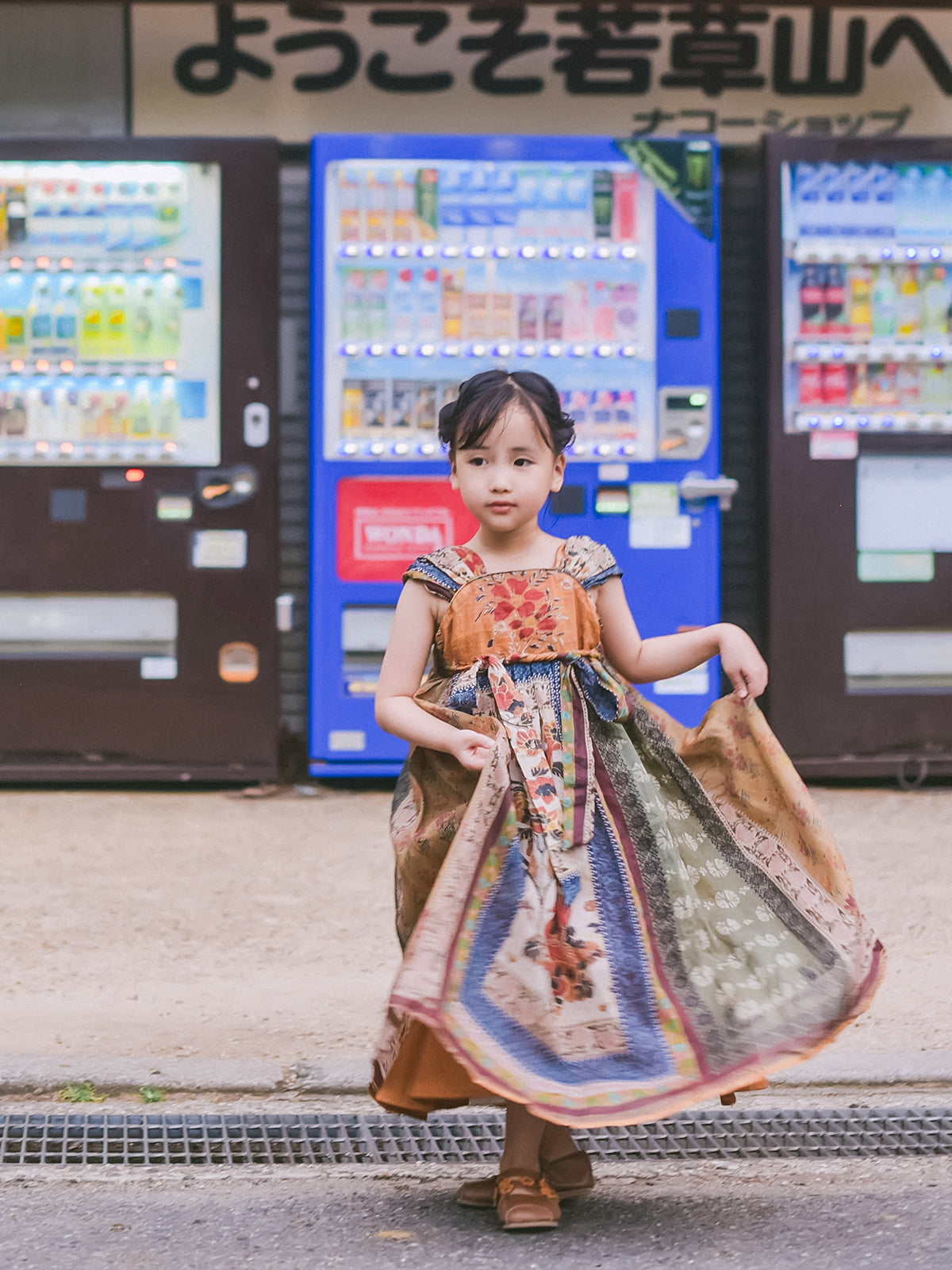 Mural Dream girls' ochre, olive and indigo Hanfu-inspired dress, outdoor portrait