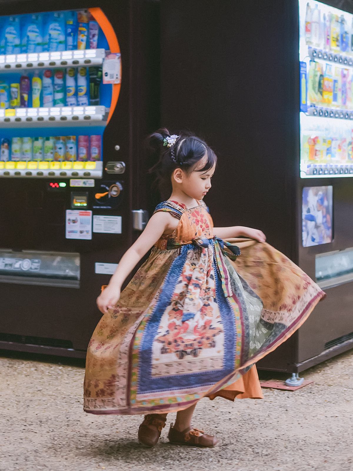Girl modeling the Mural Dream Dunhuang-inspired celebration dress