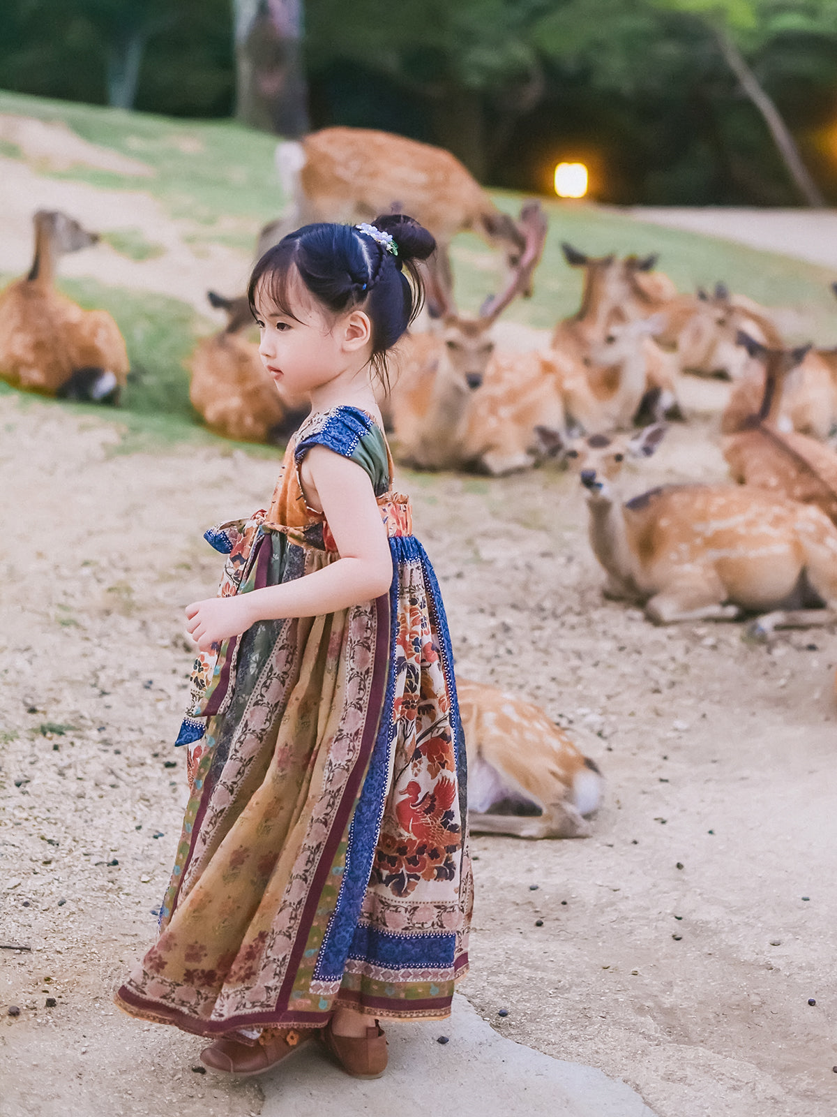 Girl wearing the Mural Dream patchwork Hanfu dress outdoors