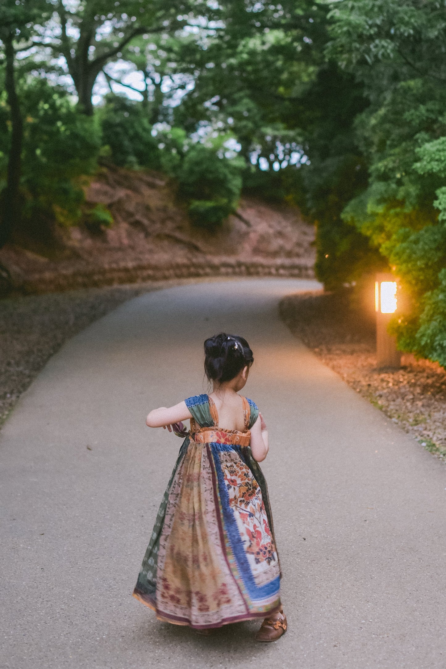 Mural Dream ochre, olive and indigo Hanfu-inspired girls' dress, lifestyle photo