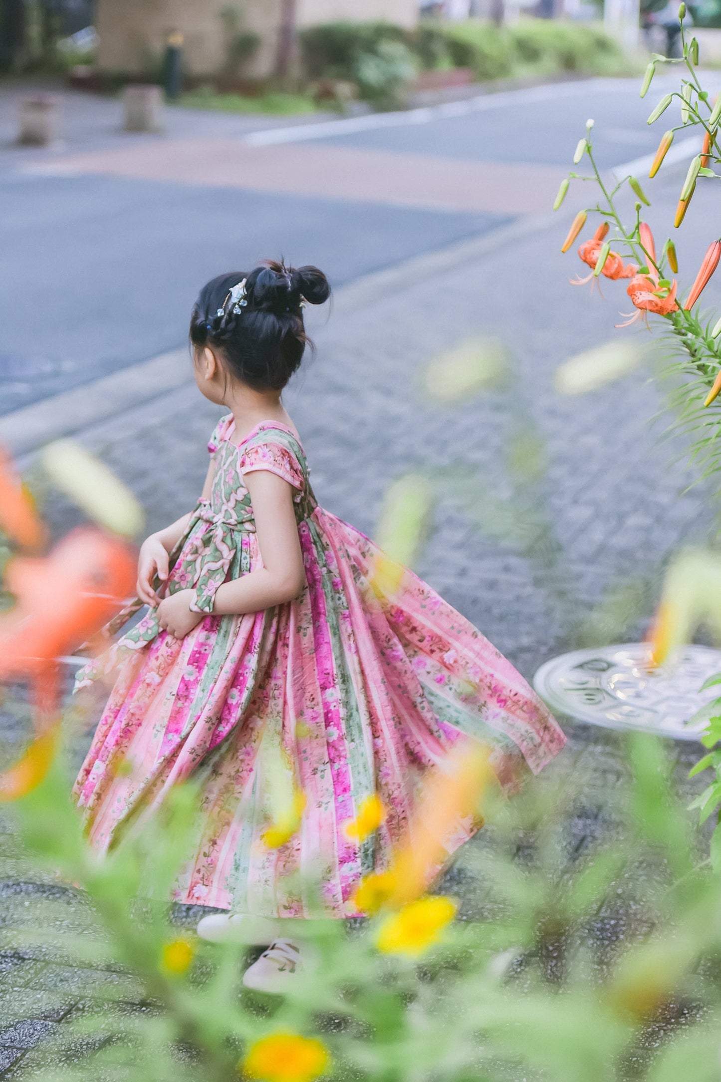 Rainbow Willow girls' pink and green floral Hanfu-inspired dress, outdoor portrait